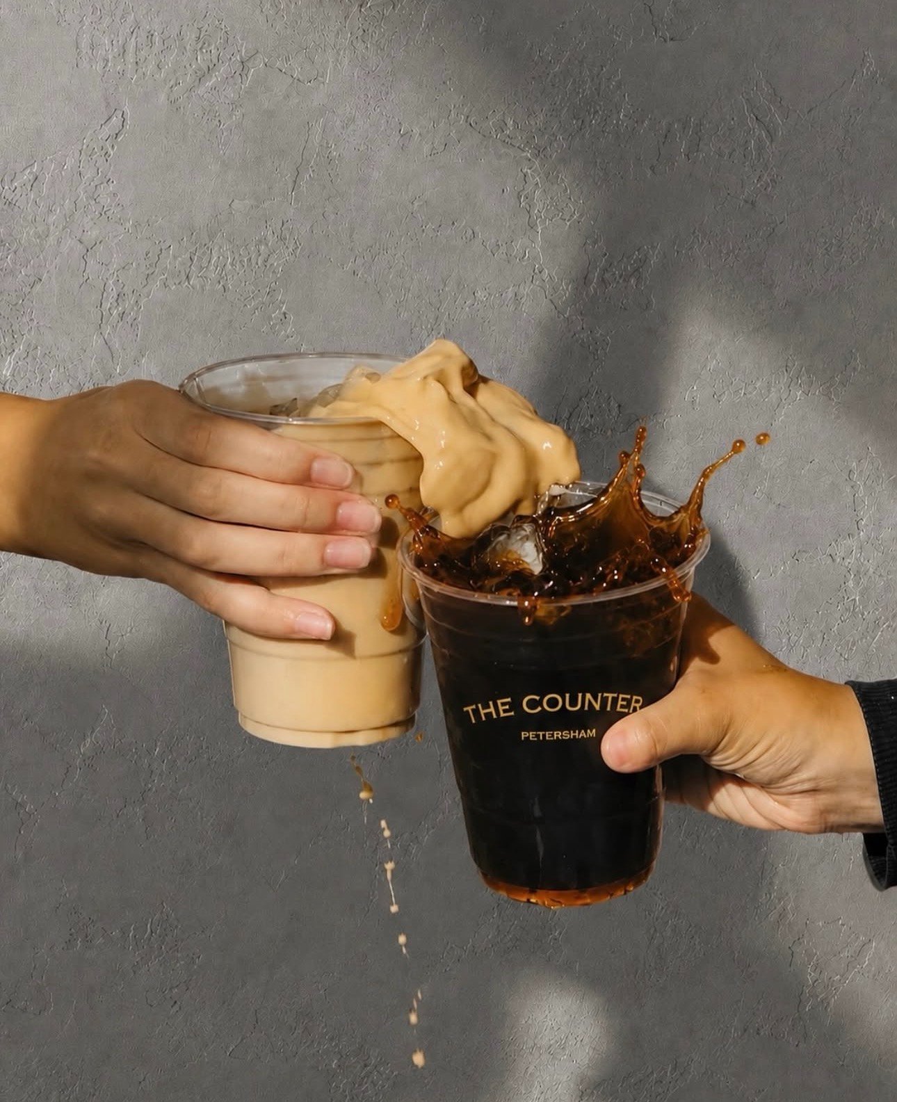 Iced latte and cold brew in The Counter Petersham branded cups