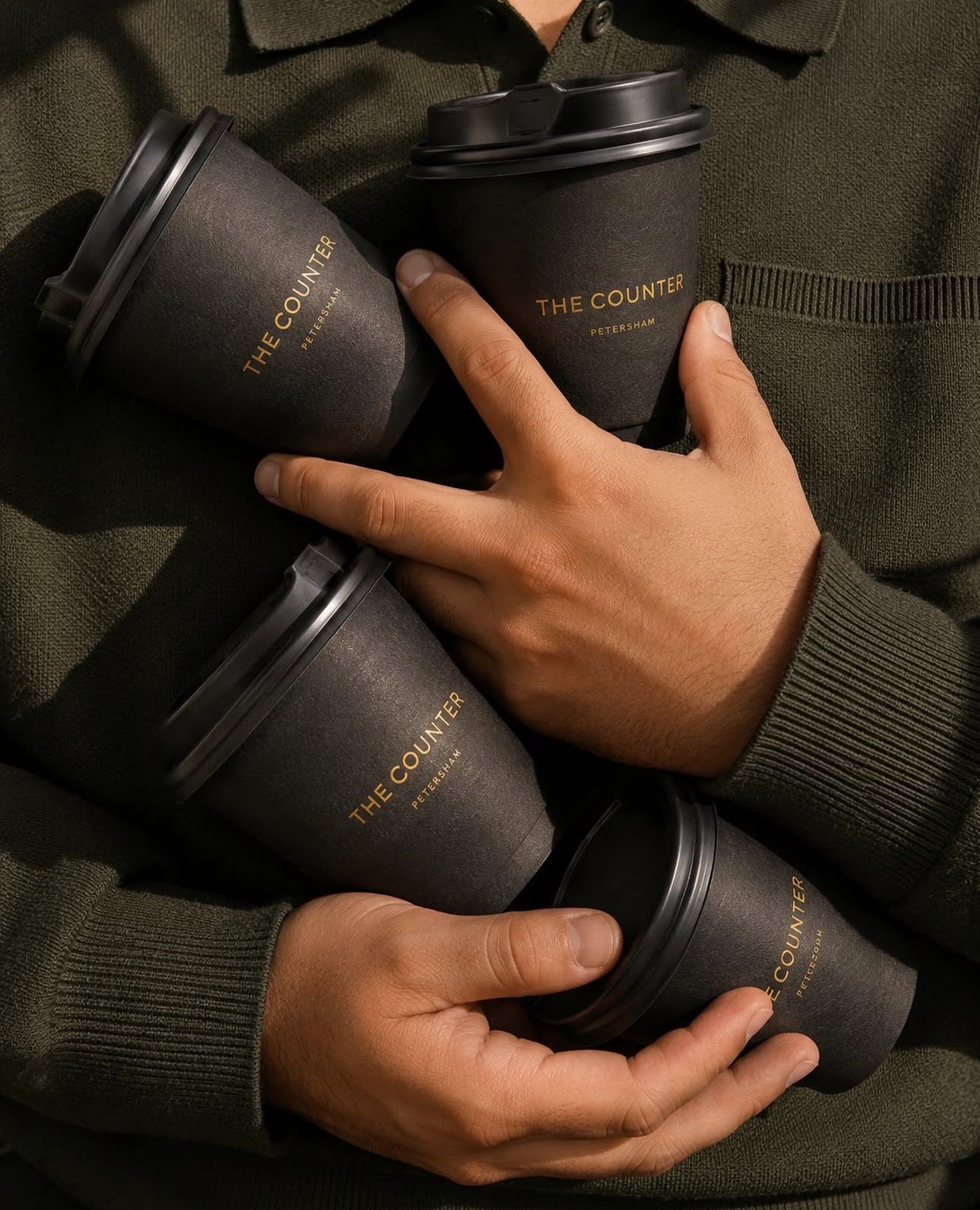 Four The Counter Petersham branded takeaway coffee cups